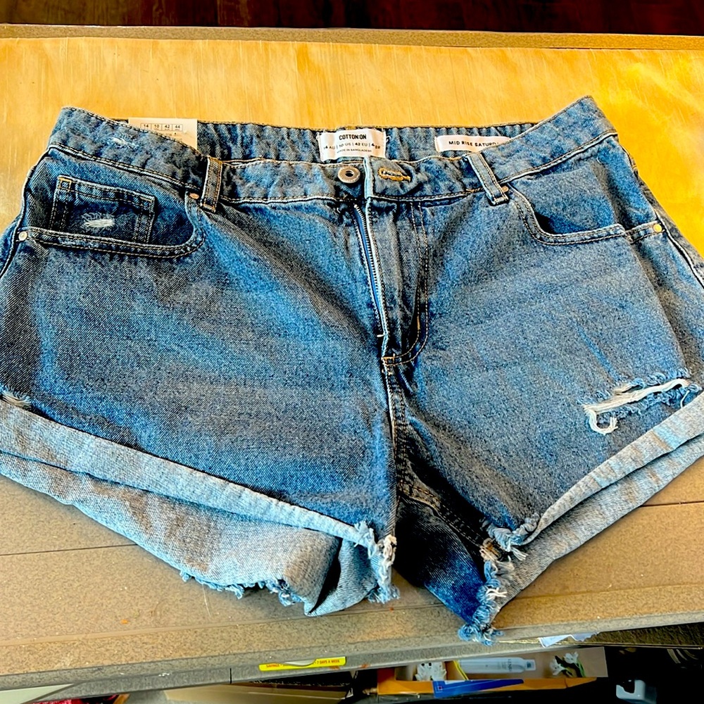 Denim distressed shorts, size 10